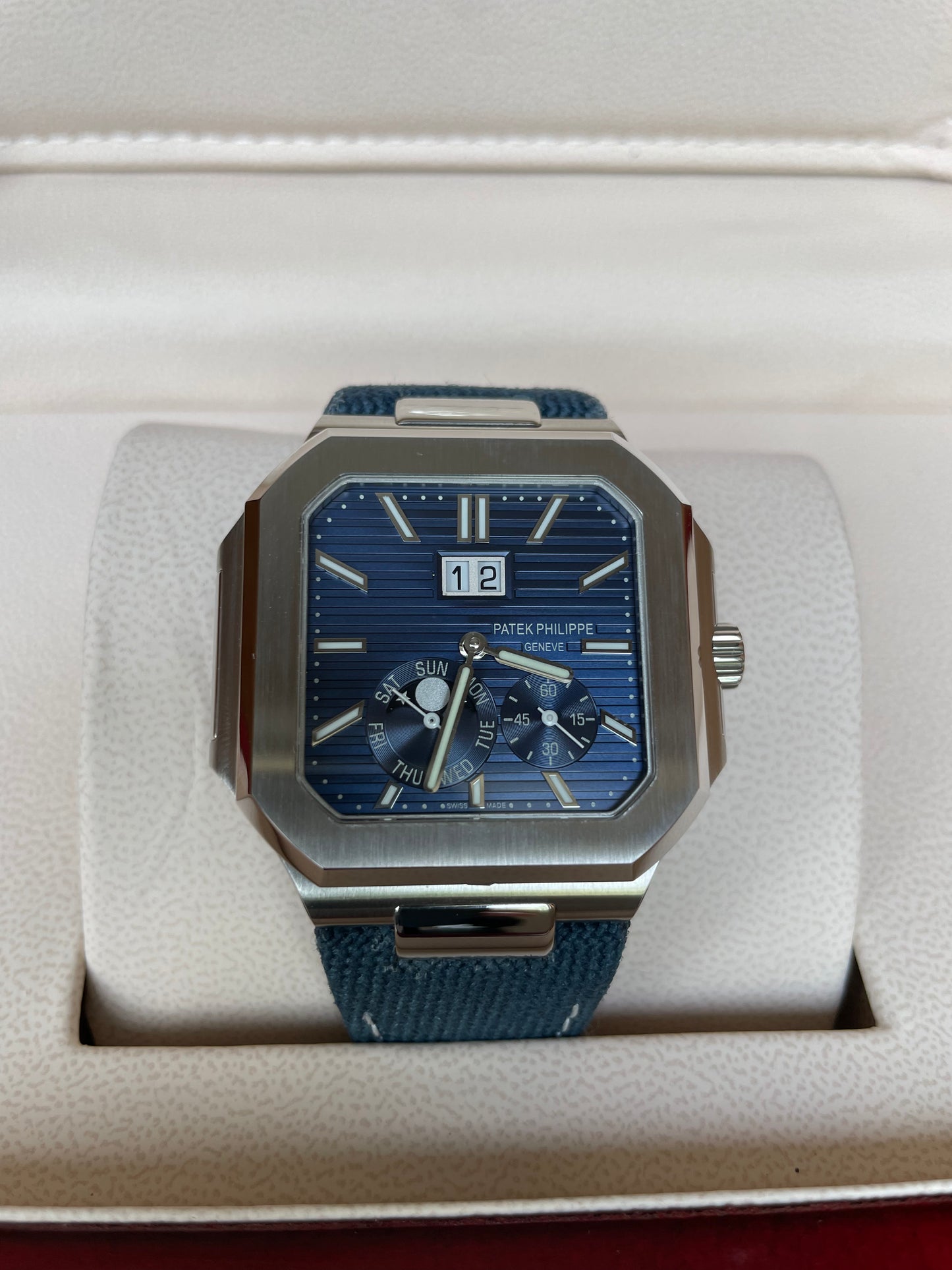 Cubitus Sunburst - Blue Dial Platinum