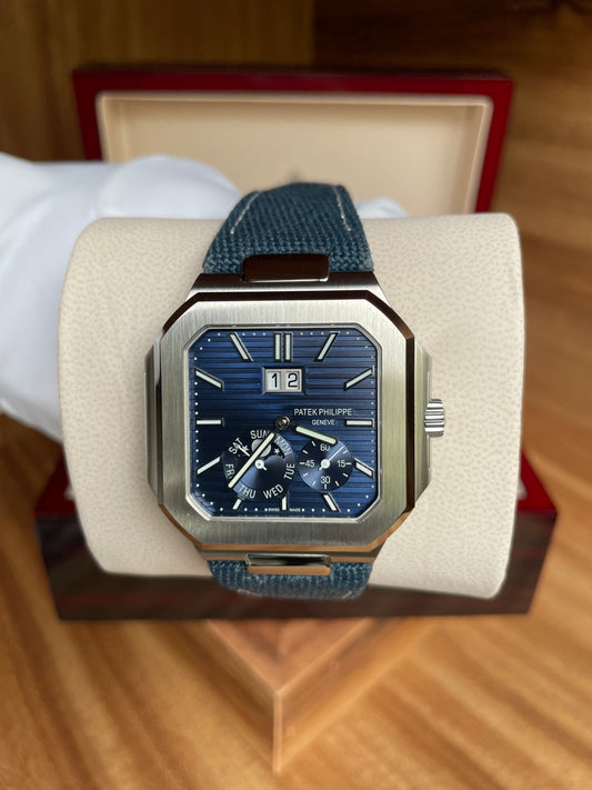 Cubitus Sunburst - Blue Dial Platinum