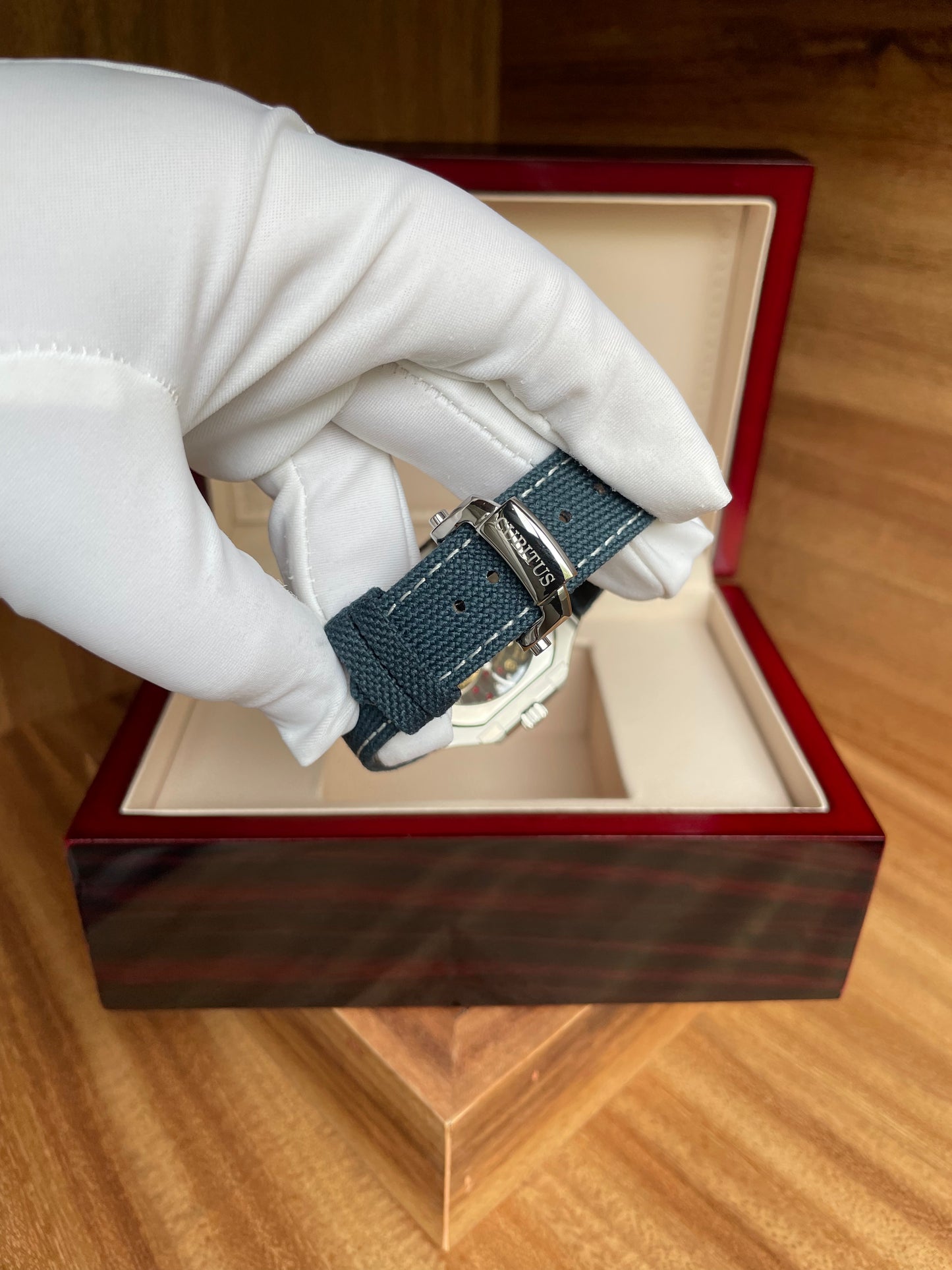 Cubitus Sunburst - Blue Dial Platinum